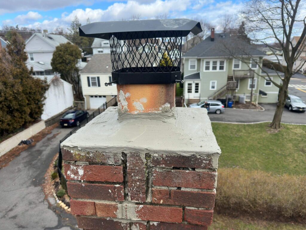 A chimney crown and cap after being serviced