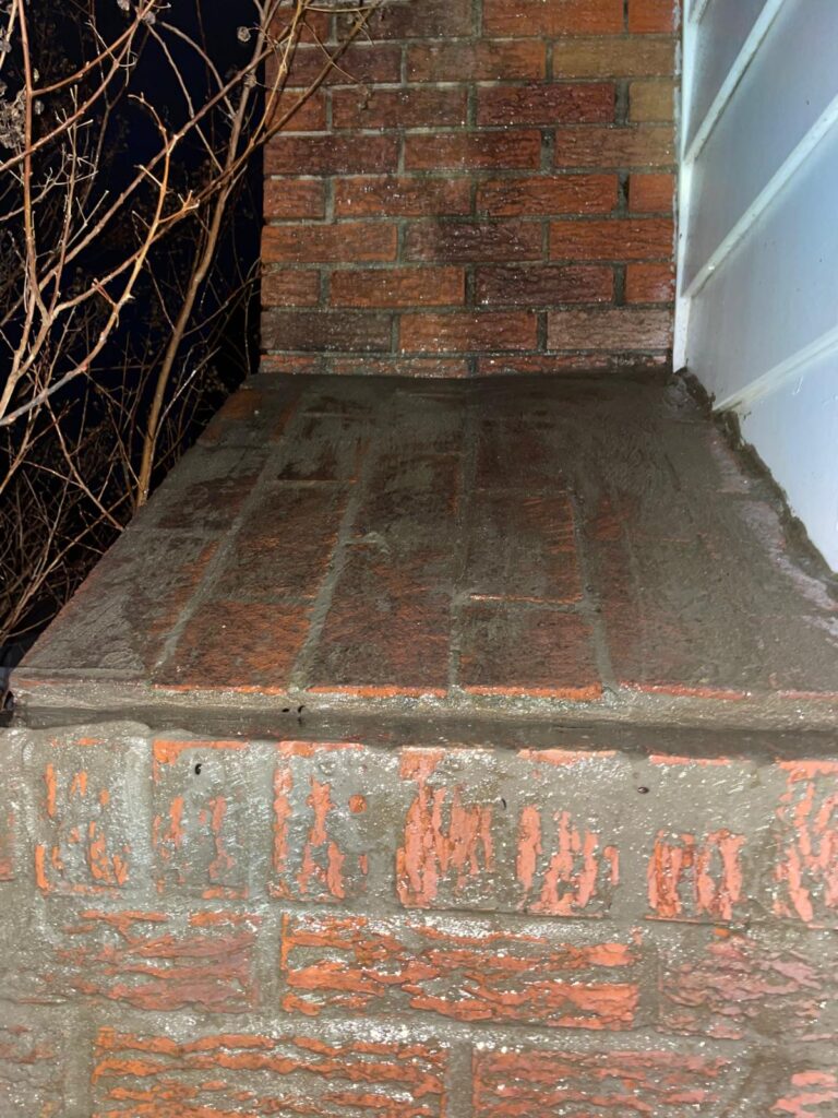 a chimneys stack shoulder after being repaired and water proofed by a chimmney sweep