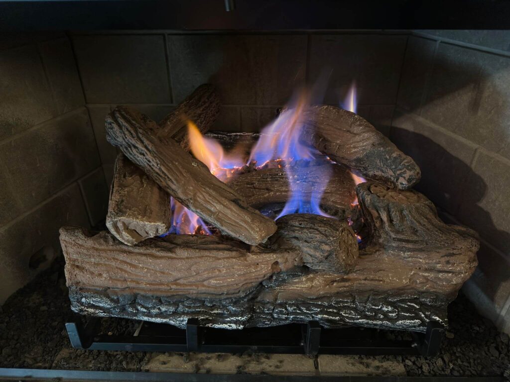 a gas fireplace after it was set up and serviced by a chimney sweep