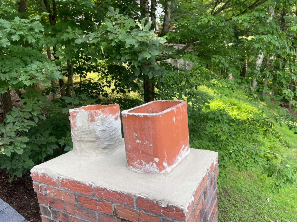 a chimney fkue after being restored and serviced by a chimney sweep