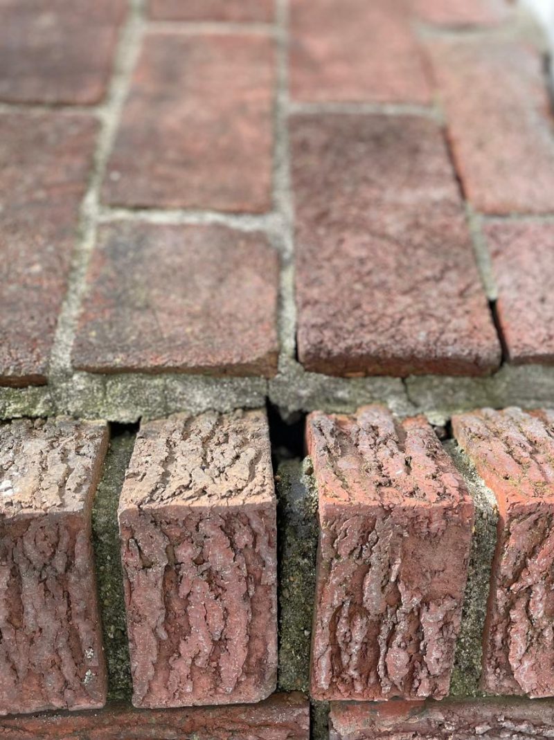 a badly damaged chimney shoulder before beig repaired and serviced by a chimney sweep