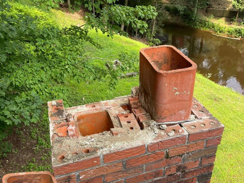 a chimney flue before being restored and serviced by a chimney sweep